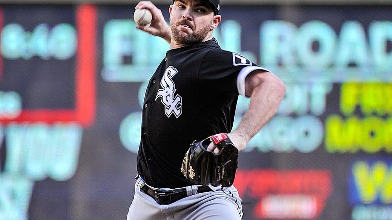 Sep 29, 2022; Minneapolis, Minnesota, USA; Chicago White Sox relief pitcher Liam Hendriks (31) throws a pitch against the Minnesota Twins during the ninth inning at Target Field. Mandatory Credit: Jeffrey Becker-USA TODAY Sports