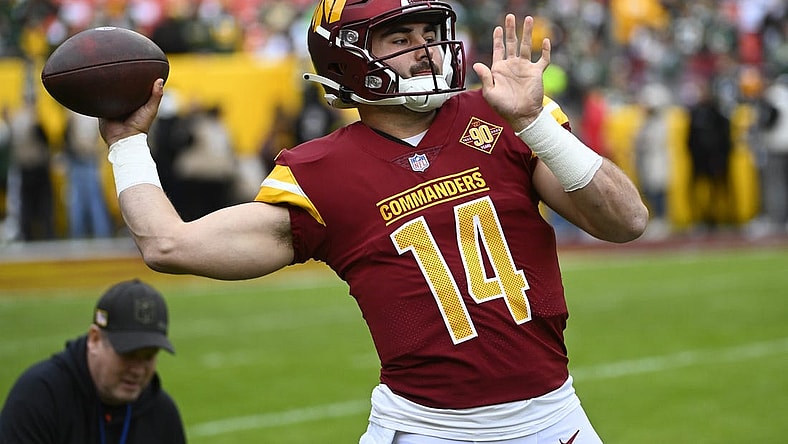 Oct 23, 2022; Landover, Maryland, USA; Washington Commanders quarterback Sam Howell (14) on the field before the game against the Green Bay Packers at FedExField. Mandatory Credit: Brad Mills-USA TODAY Sports