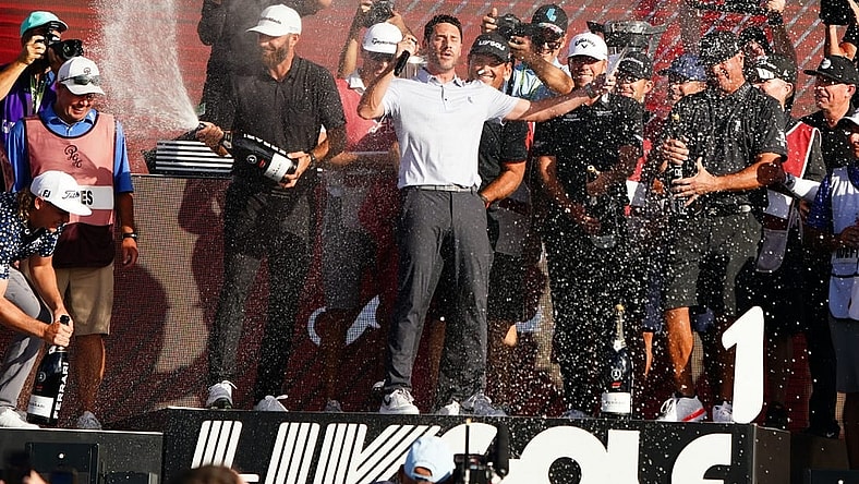 Oct 30, 2022; Miami, Florida, USA; Dustin Johnson , Patrick Reed , Talor Gooch and Pat Perez celebrates team 4Aces GC winning the season finale of the LIV Golf series at Trump National Doral. Mandatory Credit: John David Mercer-USA TODAY Sports