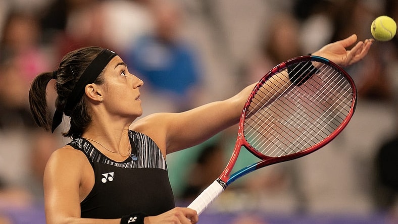 Nov 1, 2022; Forth Worth, TX, USA; Caroline Garcia (FRA) tosses the ball to serve during her match against Coco Gauff (USA) on day two of the WTA Finals at Dickies Arena. Mandatory Credit: Susan Mullane-USA TODAY Sports