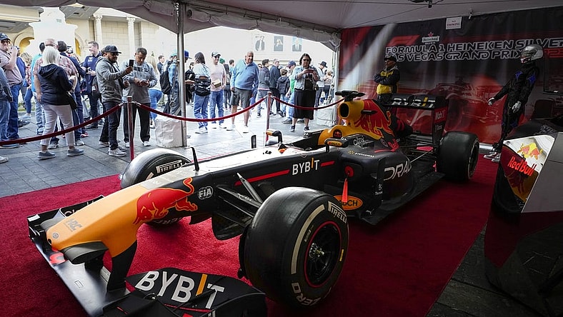 Nov 5, 2022; Las Vegas, Nevada, USA; Race fans view a car during the Formula One Las Vegas Grand Prix Launch Party at Las Vegas Strip. Mandatory Credit: Ray Acevedo-USA TODAY Sports