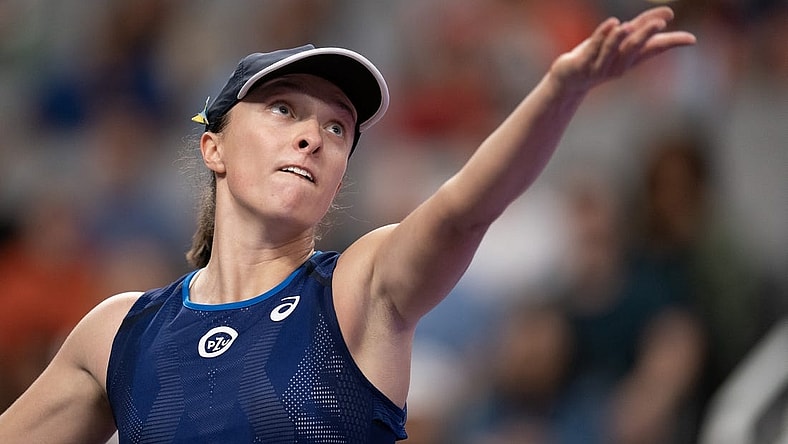 Nov 6, 2022; Forth Worth, TX, USA; Iga Swiatek (POL) tosses the ball to serve during her semi final match against Aryna Sabalenka on day seven of the WTA Finals at Dickies Arena. Mandatory Credit: Susan Mullane-USA TODAY Sports