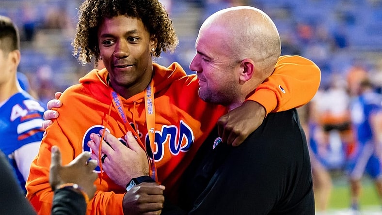 Florida Gators offensive coordinator Rob Sale hugs Florida Gators recruit Jaden Rashada after the game against the South Carolina Gamecocks at Steve Spurrier Field at Ben Hill Griffin Stadium in Gainesville, FL on Saturday, November 12, 2022. [Matt Pendleton/Gainesville Sun]

Ncaa Football Florida Gators Vs South Carolina Gamecocks