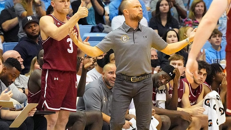 Nov 11, 2022; Chapel Hill, North Carolina, USA;  Charleston Cougars head coach Pat Kelsey and guard Dalton Bolon (3) react against the North Carolina Tar Heels during the second half at Dean E. Smith Center. Mandatory Credit: James Guillory-USA TODAY Sports