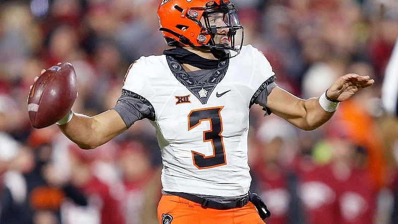 Oklahoma State's Spencer Sanders (3) looks to throw a pass in the first half during the Bedlam college football game between the University of Oklahoma Sooners (OU) and the Oklahoma State University Cowboys (OSU) at Gaylord Family-Oklahoma Memorial Stadium, in Norman, Okla., Saturday, Nov., 19, 2022.

cover main