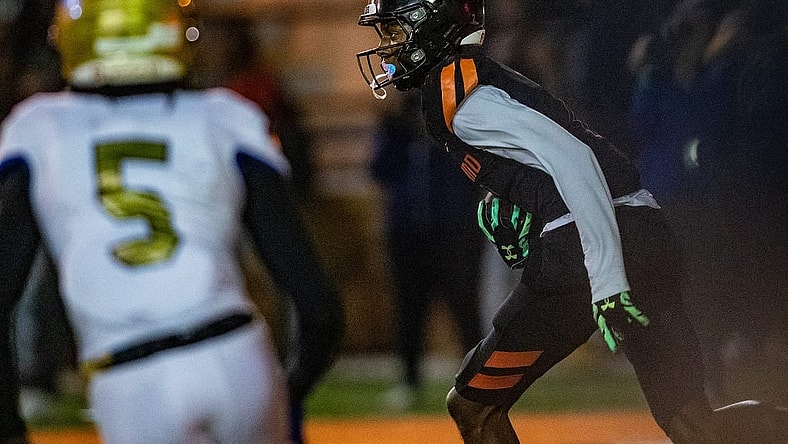 Lakeland (7) Cormani McClain runs back an interception against Osceola during first half action in Lakeland Fl  Friday December 2,2022.Ernst Peters/The Ledger

120222 Ep Preps 9 News