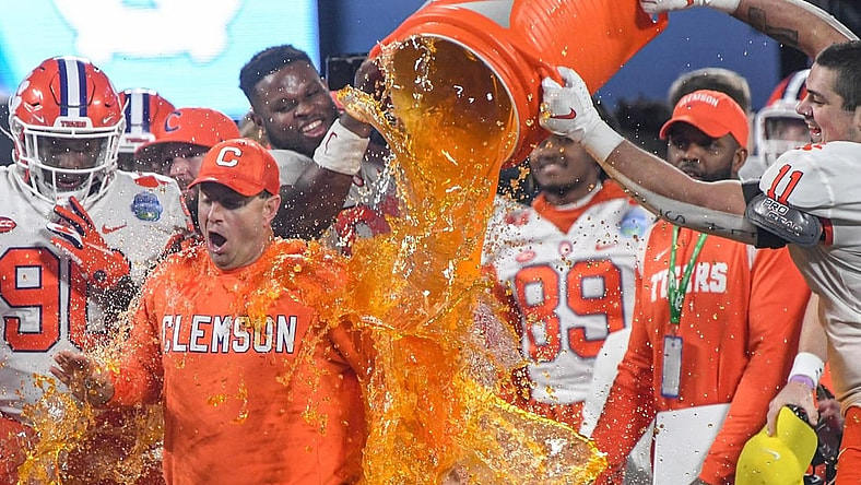 Clemson head coach Dabo Swinney gets dunked with sports drink by Clemson defensive lineman Bryan Bresee (11) during the fourth quarter of the ACC Championship football game at Bank of America Stadium in Charlotte, North Carolina Saturday, Dec 3, 2022.
Clemson Tigers Football Vs North Carolina Tar Heels Acc Championship Charlotte Nc