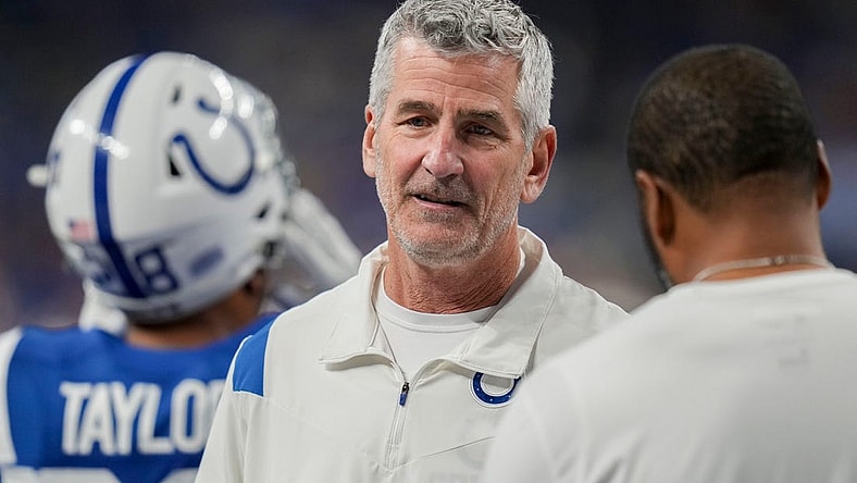 Indianapolis Colts head coach Frank Reich talks on the field Sunday, Oct. 30, 2022, before a game against the Washington Commanders at Indianapolis Colts at Lucas Oil Stadium in Indianapolis.