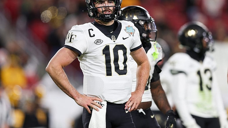 Dec 23, 2022; Tampa, Florida, USA; Wake Forest Demon Deacons quarterback Sam Hartman (10) waits for a play call against the Missouri Tigers during the second quarter in the 2022 Gasparilla Bowl at Raymond James Stadium. Mandatory Credit: Nathan Ray Seebeck-USA TODAY Sports