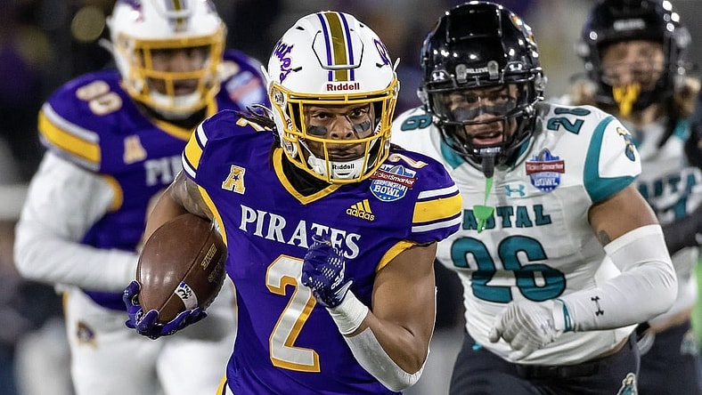 Dec 27, 2022; Birmingham, Alabama, USA; East Carolina Pirates running back Keaton Mitchell (2) runs for a gain against the Coastal Carolina Chanticleers in the 2022 Birmingham Bowl at Protective Stadium. Mandatory Credit: Vasha Hunt-USA TODAY Sports