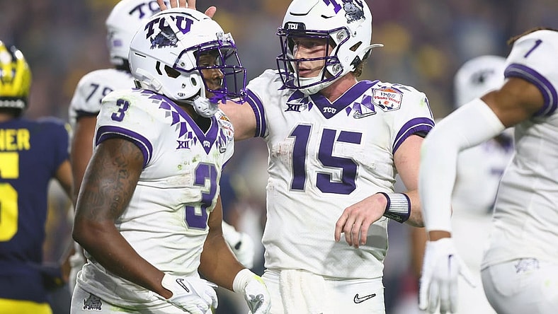 Dec 31, 2022; Glendale, Arizona, USA; TCU Horned Frogs running back Emari Demercado (3) celebrates after making a touchdown with quarterback Max Duggan (15) against the Michigan Wolverines in the third quarter of the 2022 Fiesta Bowl at State Farm Stadium. Mandatory Credit: Mark J. Rebilas-USA TODAY Sports