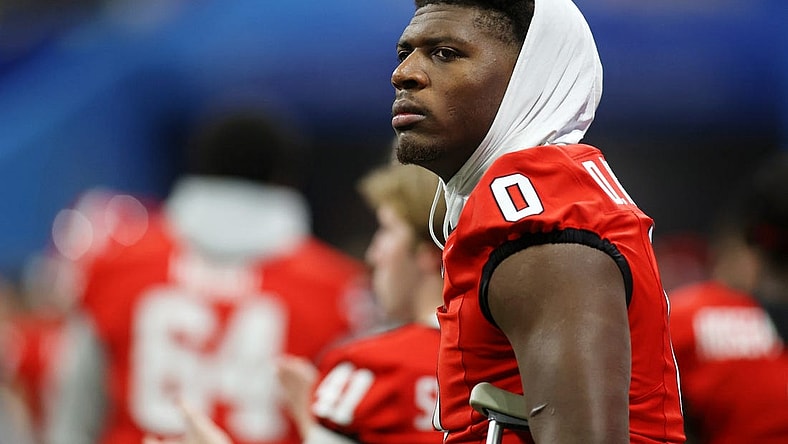 Dec 31, 2022; Atlanta, Georgia, USA; Georgia Bulldogs tight end Darnell Washington (0) looks on from the sideline after exiting the game with an injury against the Ohio State Buckeyes during the third quarter of the 2022 Peach Bowl at Mercedes-Benz Stadium. Mandatory Credit: Brett Davis-USA TODAY Sports