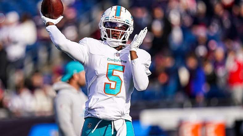 Jan 1, 2023; Foxborough, Massachusetts, USA; Miami Dolphins quarterback Teddy Bridgewater (5) warms up before the start of the game against the New England Patriots at Gillette Stadium. Mandatory Credit: David Butler II-USA TODAY Sports