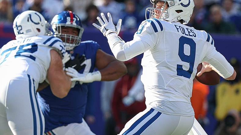 Jan 1, 2023; East Rutherford, New Jersey, USA;  Indianapolis Colts quarterback Nick Foles (9) throws the ball during the first quarter against the New York Giants at MetLife Stadium. Mandatory Credit: Vincent Carchietta-USA TODAY Sports