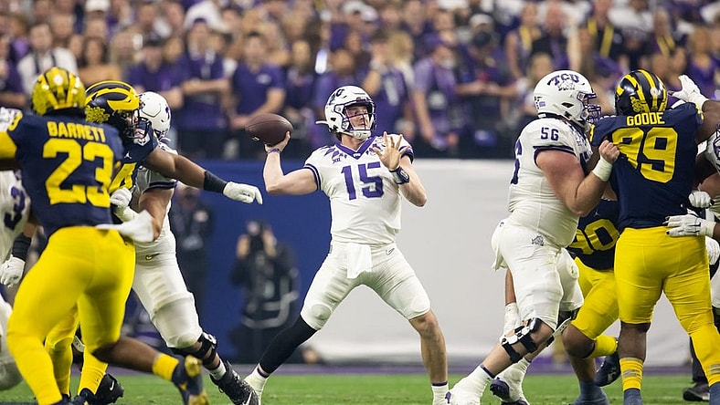 Dec 31, 2022; Glendale, Arizona, USA; TCU Horned Frogs quarterback Max Duggan (15) against the Michigan Wolverines during the 2022 Fiesta Bowl at State Farm Stadium. Mandatory Credit: Mark J. Rebilas-USA TODAY Sports