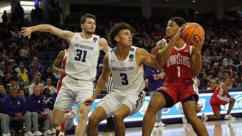 Jan 1, 2023; Evanston, Illinois, USA; Northwestern Wildcats guard Ty Berry (3) defends Ohio State Buckeyes guard Roddy Gayle Jr. (1) during the first half at Welsh-Ryan Arena. Mandatory Credit: David Banks-USA TODAY Sports