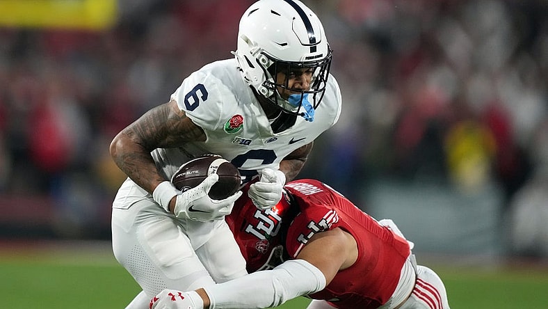 Jan 2, 2023; Pasadena, California, USA; Penn State Nittany Lions wide receiver Harrison Wallace III (6) makes a catch against Utah Utes safety R.J. Hubert (11) in the second half of the 109th Rose Bowl game at the Rose Bowl. Mandatory Credit: Kirby Lee-USA TODAY Sports