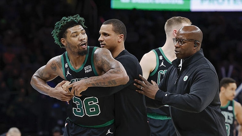 Jan 3, 2023; Oklahoma City, Oklahoma, USA; Boston Celtics guard Marcus Smart (36) is held back by head coach Joe Mazzulla after he reacts to getting ejected following a play against the Oklahoma City Thunder in the second half at Paycom Center. Oklahoma City won 150-117. Mandatory Credit: Alonzo Adams-USA TODAY Sports