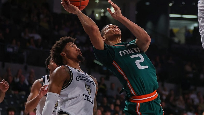 Jan 4, 2023; Atlanta, Georgia, USA; Miami Hurricanes guard Isaiah Wong (2) shoots against the Georgia Tech Yellow Jackets in the first half at McCamish Pavilion. Mandatory Credit: Brett Davis-USA TODAY Sports