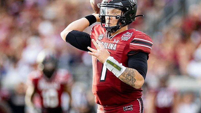 Dec 30, 2022; Jacksonville, FL, USA; South Carolina Gamecocks quarterback Spencer Rattler (7) throws the ball during the first half against the Notre Dame Fighting Irish in the 2022 Gator Bowl at TIAA Bank Field. Mandatory Credit: Matt Pendleton-USA TODAY Sports