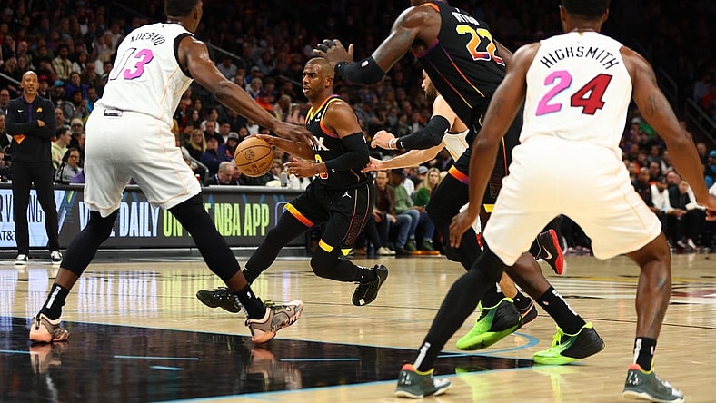 Jan 6, 2023; Phoenix, Arizona, USA; Phoenix Suns guard Chris Paul (3) against the Miami Heat in the first half at Footprint Center. Mandatory Credit: Mark J. Rebilas-USA TODAY Sports