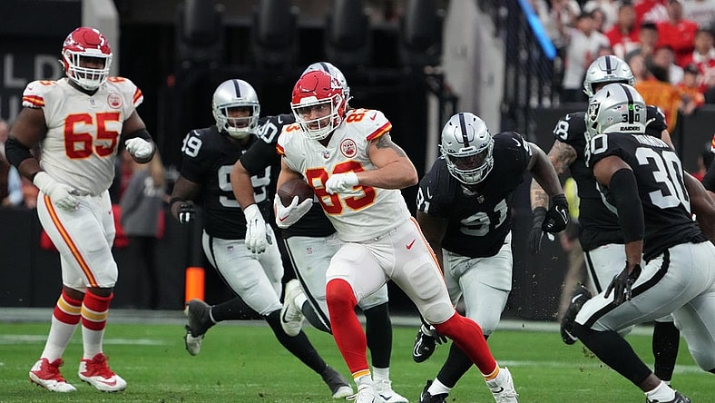 Jan 7, 2023; Paradise, Nevada, USA; Kansas City Chiefs tight end Noah Gray (83) carries the ball against the Las Vegas Raiders in the first half at Allegiant Stadium. Mandatory Credit: Kirby Lee-USA TODAY Sports