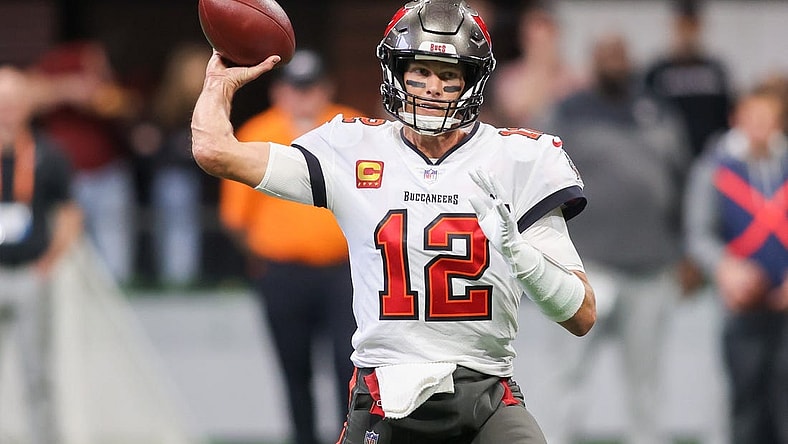 Jan 8, 2023; Atlanta, Georgia, USA; Tampa Bay Buccaneers quarterback Tom Brady (12) throws a pass against the Atlanta Falcons in the first quarter at Mercedes-Benz Stadium. Mandatory Credit: Brett Davis-USA TODAY Sports