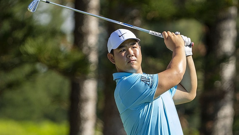 January 8, 2023; Maui, Hawaii, USA; Tom Kim hits his tee shot on the second hole during the final round of the Sentry Tournament of Champions golf tournament at Kapalua Resort - The Plantation Course. Mandatory Credit: Kyle Terada-USA TODAY Sports