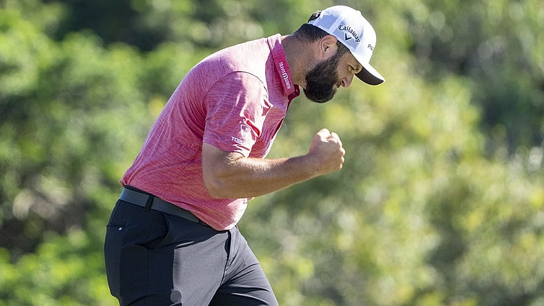 January 8, 2023; Maui, Hawaii, USA; Jon Rahm celebrates after making his putt on the 18th hole during the final round of the Sentry Tournament of Champions golf tournament at Kapalua Resort - The Plantation Course. Mandatory Credit: Kyle Terada-USA TODAY Sports