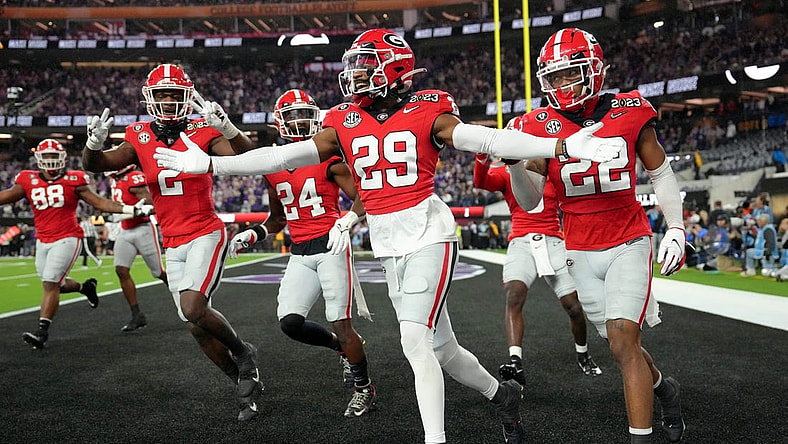 Jan 9, 2023; Inglewood, CA, USA; Georgia Bulldogs defensive back Christopher Smith (29) celebrates after defensive back Javon Bullard (22) made an interception against the TCU Horned Frogs during the second quarter of the CFP national championship game at SoFi Stadium. Mandatory Credit: Kirby Lee-USA TODAY Sports