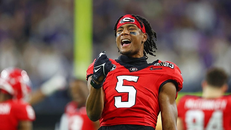 Jan 9, 2023; Inglewood, CA, USA; Georgia Bulldogs wide receiver Adonai Mitchell (5) reacts after a play against the TCU Horned Frogs during the third quarter of the CFP national championship game at SoFi Stadium. Mandatory Credit: Mark J. Rebilas-USA TODAY Sports