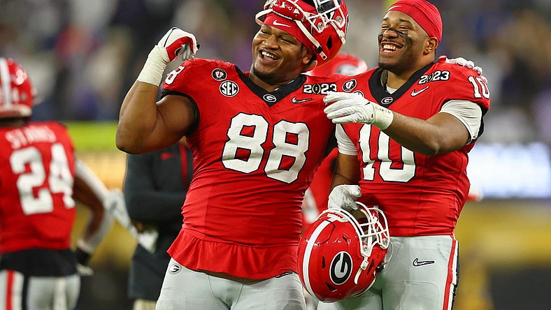 Jan 9, 2023; Inglewood, CA, USA; Georgia Bulldogs defensive lineman Jalen Carter (88) and linebacker Jamon Dumas-Johnson (10) react after a play against the TCU Horned Frogs during the fourth quarter of the CFP national championship game at SoFi Stadium. Mandatory Credit: Mark J. Rebilas-USA TODAY Sports