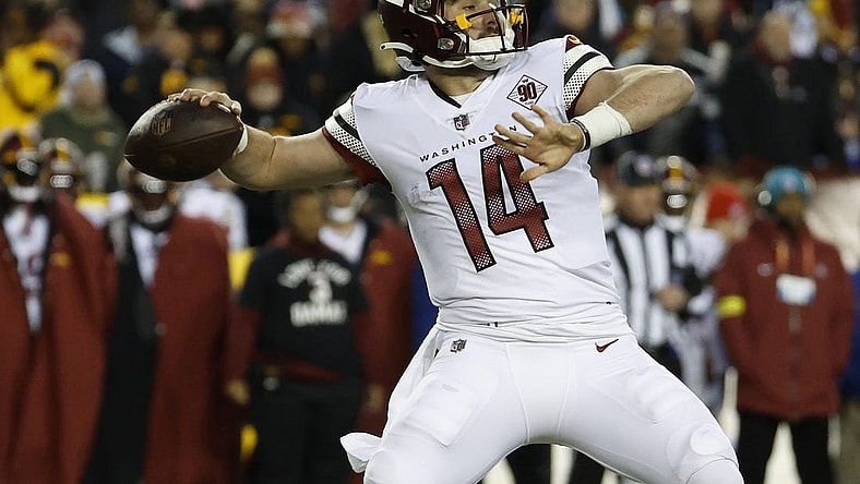 Jan 8, 2023; Landover, Maryland, USA; Washington Commanders quarterback Sam Howell (14) passes the ball against the Dallas Cowboys at FedExField. Mandatory Credit: Geoff Burke-USA TODAY Sports
