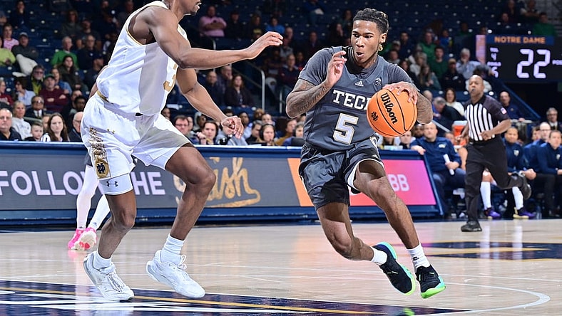 Jan 10, 2023; South Bend, Indiana, USA; Georgia Tech Yellow Jackets guard Deivon Smith (5) drives to the basket as Notre Dame Fighting Irish guard Trey Wertz (3) defends in the first half at the Purcell Pavilion. Mandatory Credit: Matt Cashore-USA TODAY Sports