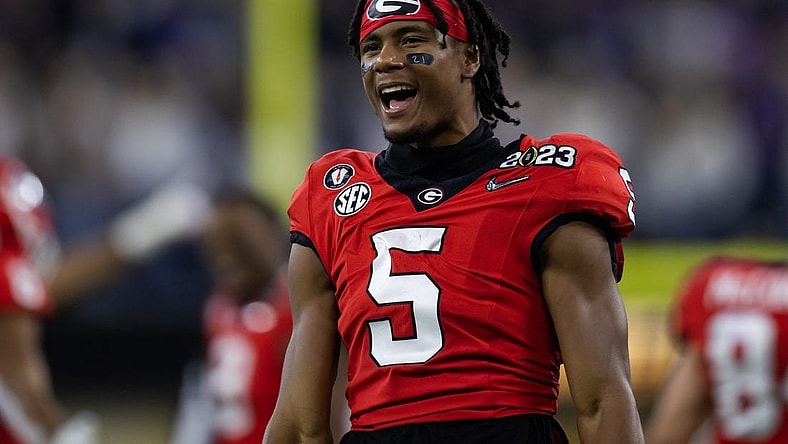 Jan 9, 2023; Inglewood, CA, USA; Georgia Bulldogs wide receiver Adonai Mitchell (5) celebrates against the TCU Horned Frogs during the CFP national championship game at SoFi Stadium. Mandatory Credit: Mark J. Rebilas-USA TODAY Sports