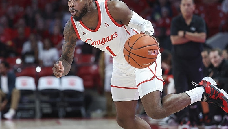 Jan 11, 2023; Houston, Texas, USA; Houston Cougars guard Jamal Shead (1) in action during the game against the South Florida Bulls at Fertitta Center. Mandatory Credit: Troy Taormina-USA TODAY Sports