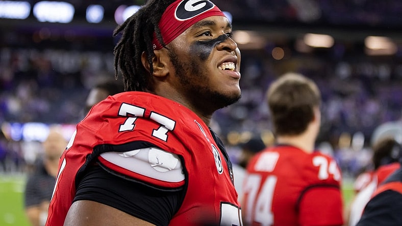 Jan 9, 2023; Inglewood, CA, USA; Georgia Bulldogs offensive lineman Devin Willock (77) against the TCU Horned Frogs during the CFP national championship game at SoFi Stadium. Mandatory Credit: Mark J. Rebilas-USA TODAY Sports