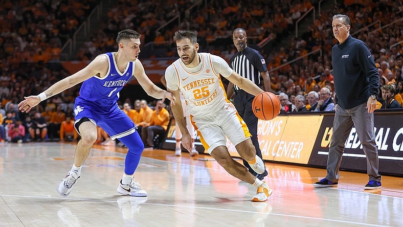 Jan 14, 2023; Knoxville, Tennessee, USA; Tennessee Volunteers guard Santiago Vescovi (25) moves the ball against Kentucky Wildcats guard CJ Fredrick (1) during the first half at Thompson-Boling Arena. Mandatory Credit: Randy Sartin-USA TODAY Sports