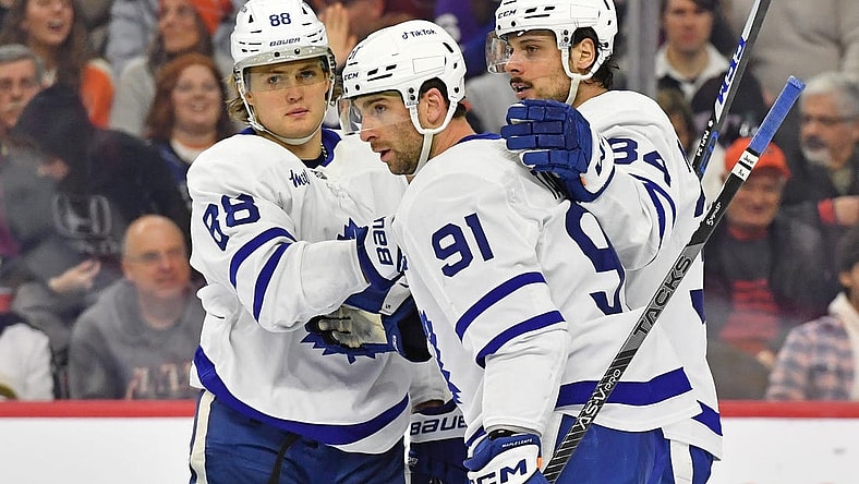 Jan 8, 2023; Philadelphia, Pennsylvania, USA; Toronto Maple Leafs right wing William Nylander (88), center John Tavares (91), and center Auston Matthews (34) celebrate a goal against the Philadelphia Flyers at Wells Fargo Center. Mandatory Credit: Eric Hartline-USA TODAY Sports