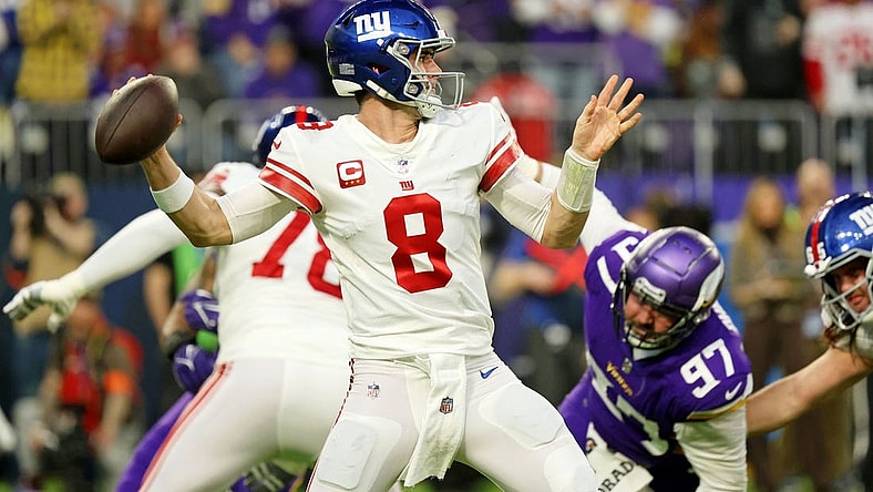 Jan 15, 2023; Minneapolis, Minnesota, USA; New York Giants quarterback Daniel Jones (8) passes the ball against the Minnesota Vikings during the first quarter of a wild card game at U.S. Bank Stadium. Mandatory Credit: Matt Krohn-USA TODAY Sports