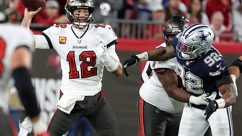Jan 16, 2023; Tampa, Florida, USA; Tampa Bay Buccaneers quarterback Tom Brady (12) drops back to pass against the Dallas Cowboys in the first half during the wild card game at Raymond James Stadium. Mandatory Credit: Kim Klement-USA TODAY Sports