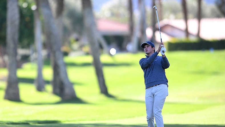 Jan 19, 2023; La Quinta, California, USA; Davis Thompson plays his second shot on the fourth hole during the first round of The American Express golf tournament at La Quinta Country Club. Mandatory Credit: Orlando Ramirez-USA TODAY Sports