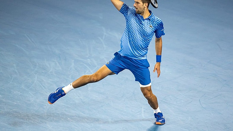 Jan 19, 2023; Melbourne, Victoria, Australia; Novak Djokovic from Serbia during his second round match against Enzo Couacaud from France on day four of the 2023 Australian Open tennis tournament at Melbourne Park. Mandatory Credit: Mike Frey-USA TODAY Sports
