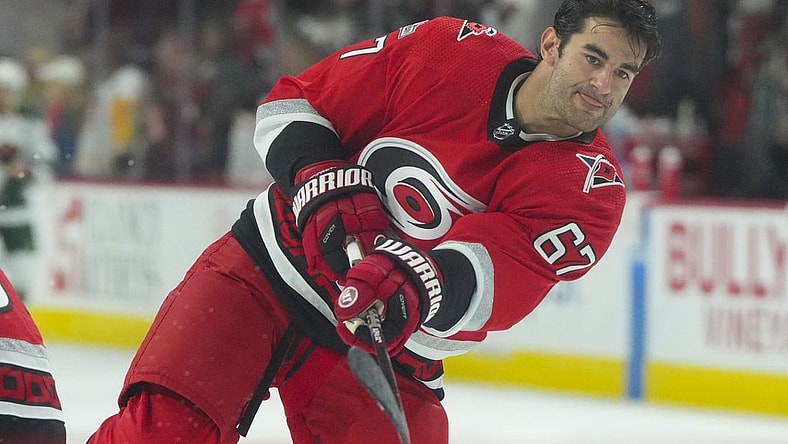 Jan 19, 2023; Raleigh, North Carolina, USA; Carolina Hurricanes left wing Max Pacioretty (67) takes a shot during warmups against the Minnesota Wild at PNC Arena. Mandatory Credit: James Guillory-USA TODAY Sports