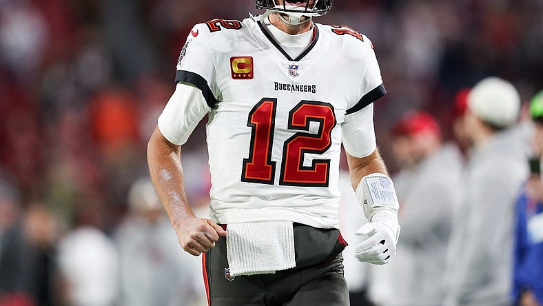 Jan 16, 2023; Tampa, Florida, USA; Tampa Bay Buccaneers quarterback Tom Brady (12) takes the field before a wild card game against the Dallas Cowboys at Raymond James Stadium. Mandatory Credit: Nathan Ray Seebeck-USA TODAY Sports