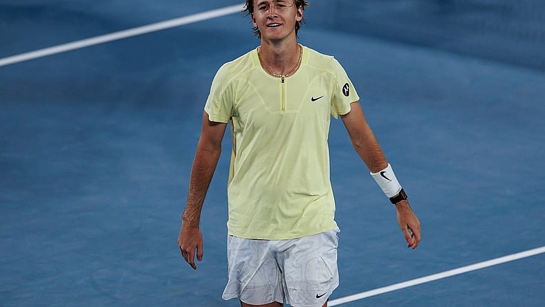 Jan 20, 2023; Melbourne, Victoria, Australia; Sebastian Korda of the United States celebrates his victory over Daniil Medvedev of Russia on day five of the 2023 Australian Open tennis tournament at Melbourne Park. Mandatory Credit: Mike Frey-USA TODAY Sports