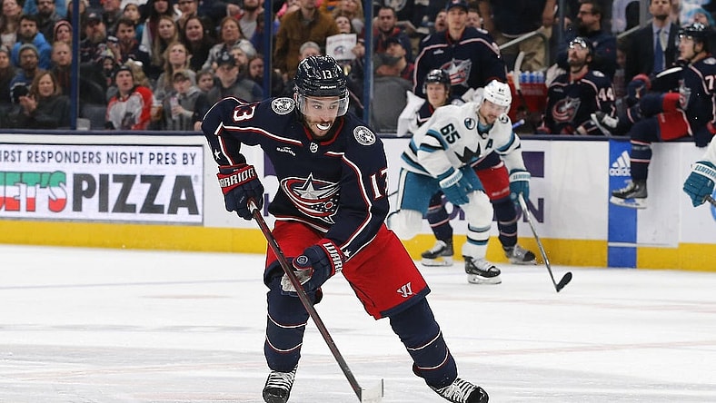 Jan 21, 2023; Columbus, Ohio, USA; Columbus Blue Jackets left wing Johnny Gaudreau (13) controls the puck against the San Jose Sharks during the third period at Nationwide Arena. Mandatory Credit: Russell LaBounty-USA TODAY Sports