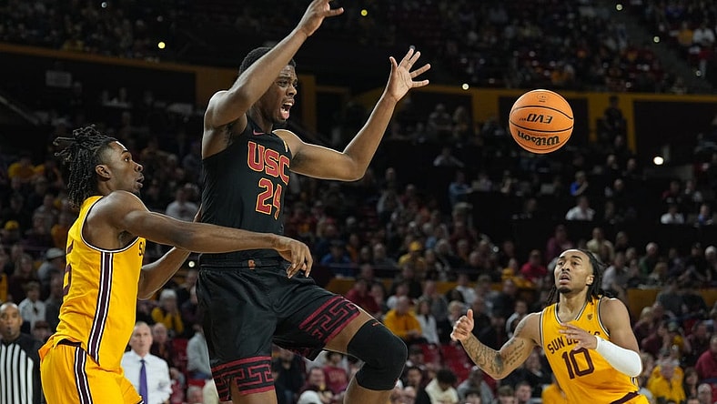 Jan 21, 2023; Tempe, Arizona, USA; Arizona State Sun Devils forward Jamiya Neal (5) fouls USC Trojans forward Joshua Morgan (24) during the first half at Desert Financial Arena. Mandatory Credit: Joe Camporeale-USA TODAY Sports