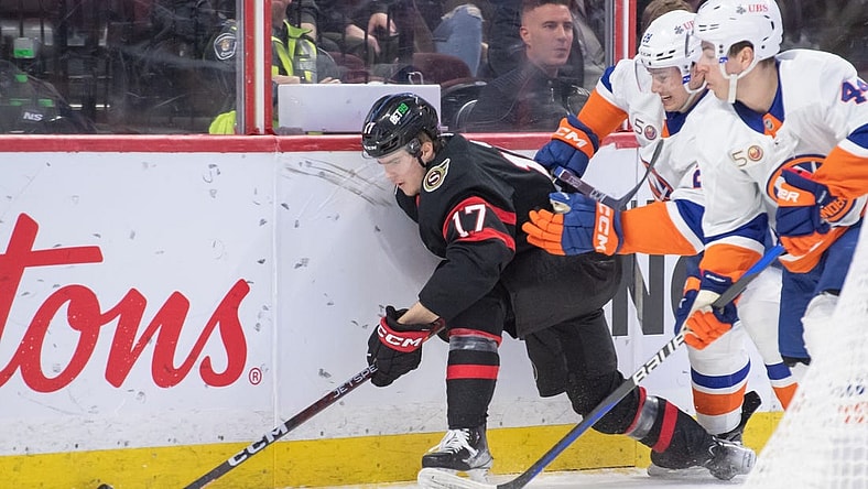 Jan 25, 2023; Ottawa, Ontario, CAN; Ottawa Senators center Ridly Greig (17) controls the puck in the first period against the New York Islanders at the Canadian Tire Centre. Mandatory Credit: Marc DesRosiers-USA TODAY Sports