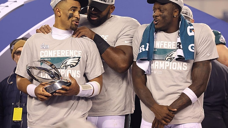 Jan 29, 2023; Philadelphia, Pennsylvania, USA; Philadelphia Eagles quarterback Jalen Hurts (1), defensive tackle Fletcher Cox (91) and wide receiver A.J. Brown (11) during the NFC Championship trophy presentation after win against the San Francisco 49ers in the NFC Championship game at Lincoln Financial Field. Mandatory Credit: Bill Streicher-USA TODAY Sports